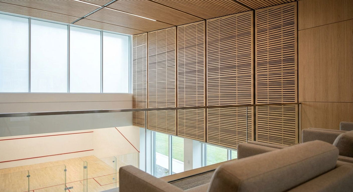Acoustic wood panels for squash court galleries