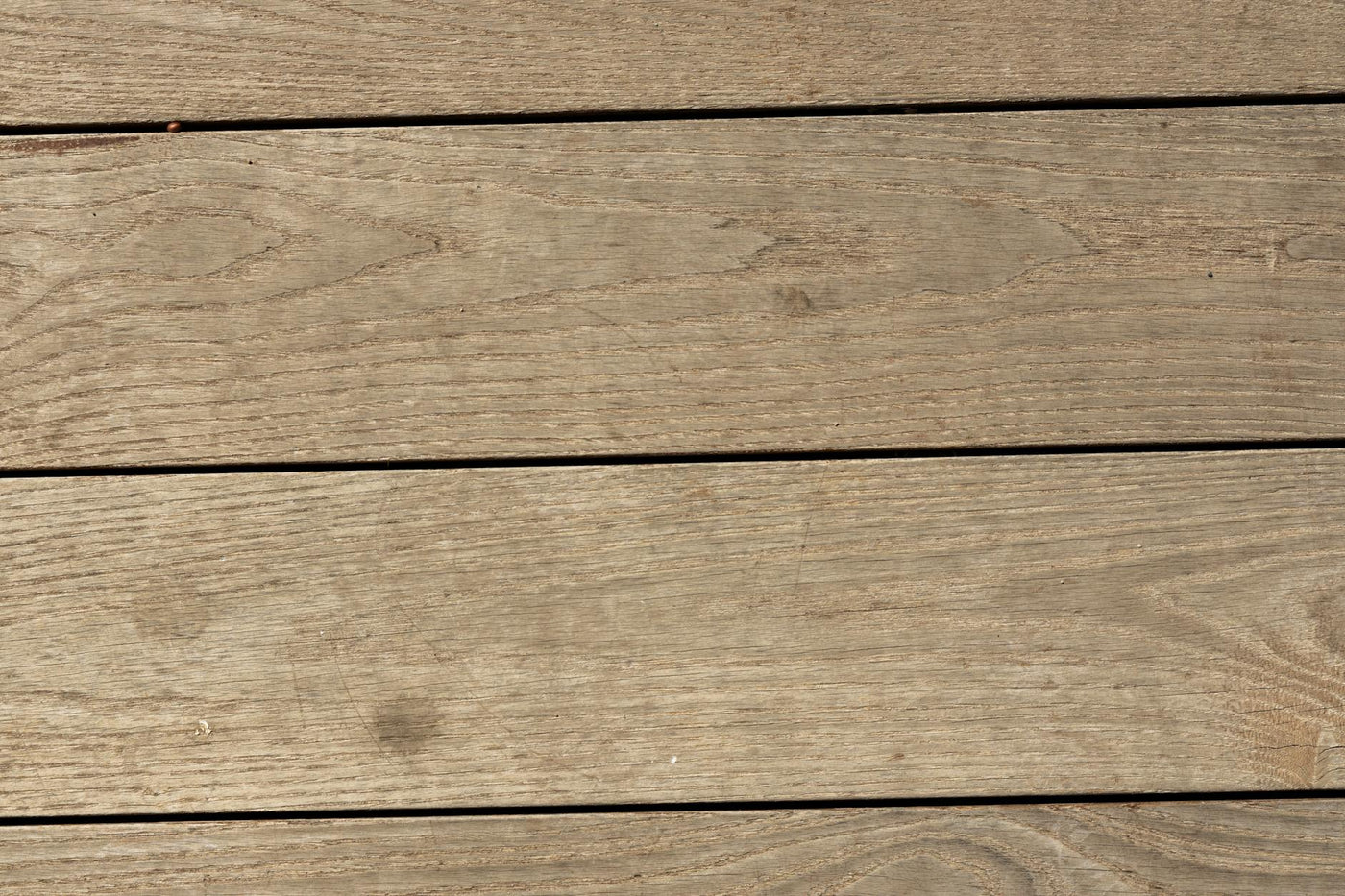 Close-up of rustic wooden planks forming a textured backdrop.