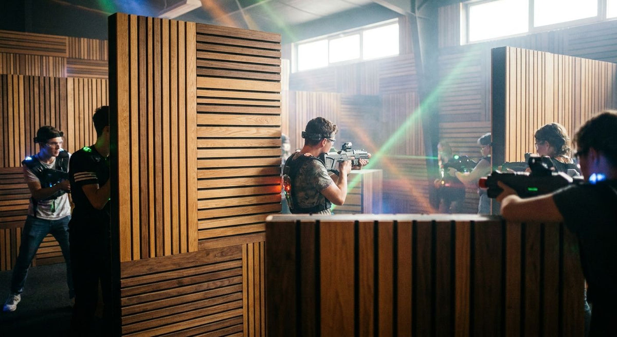 Acoustic wood panels for laser tag and immersive gaming venues